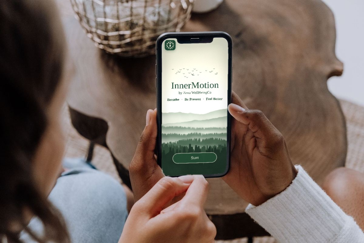 A woman holding a phone showing the InnerMotion welcome screen, about to tap Start
